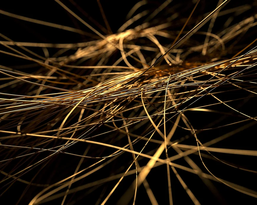Emaranhado de fios dourados sem começo nem fim visível